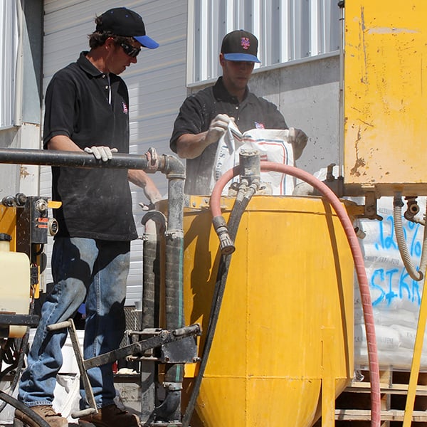 mixing cementitious grout in a high shear mixer